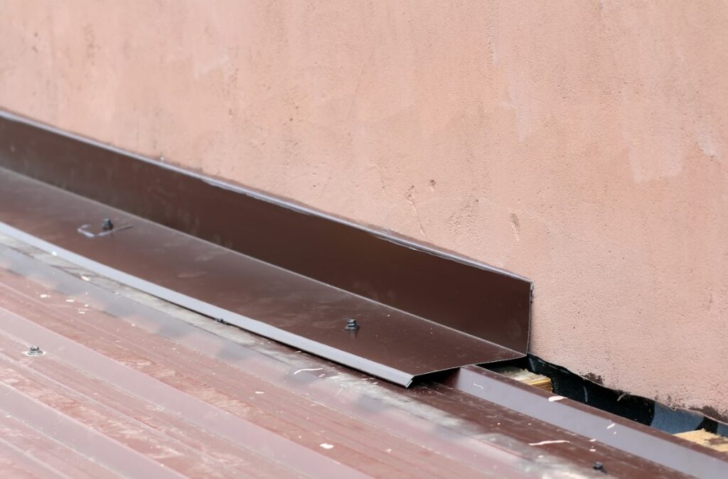 roof wind damage on roof flashing